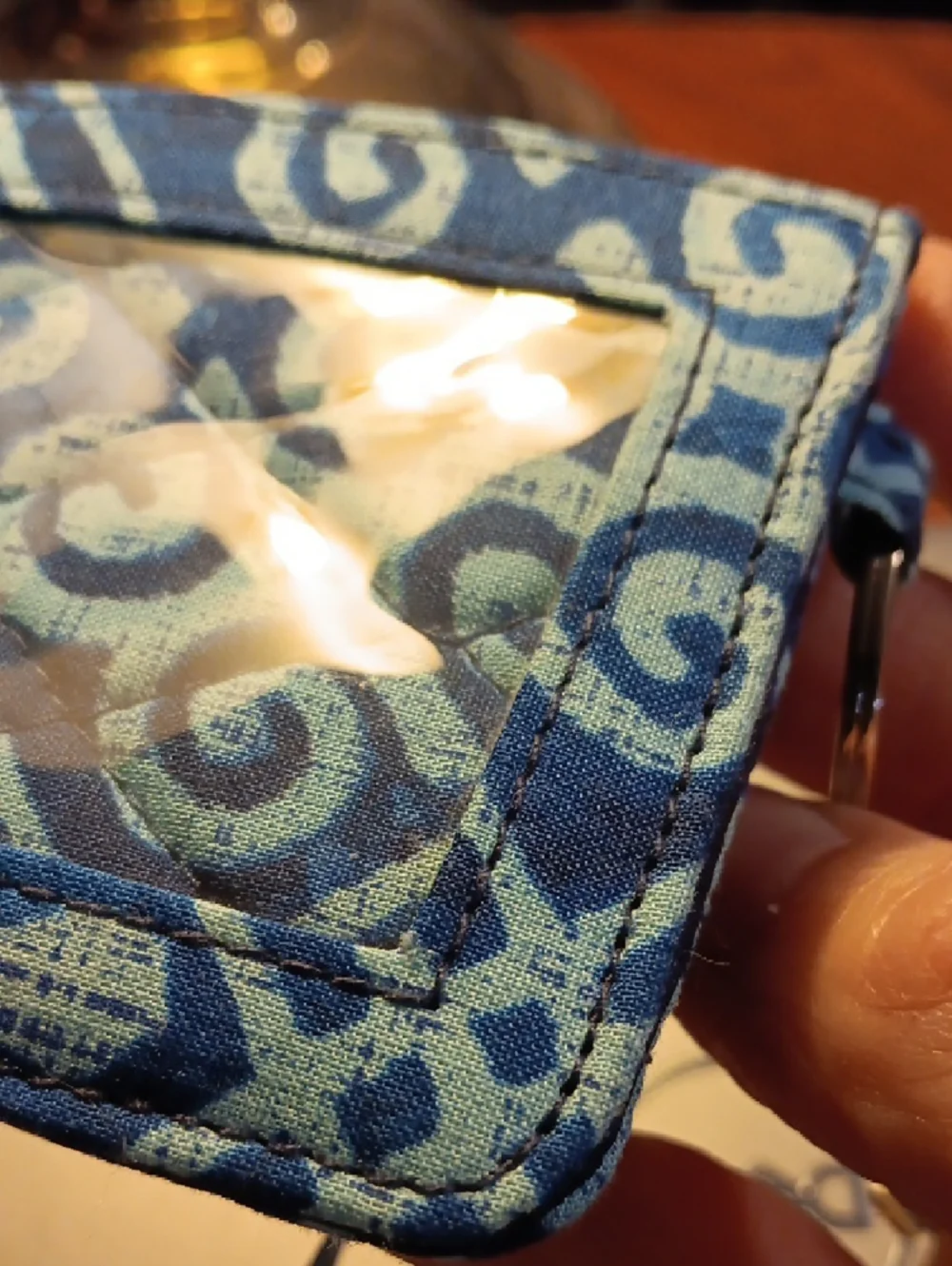Vera Bradley Zip ID Case in a blue batik-inspired geometric pattern. - Picture 10 of 11